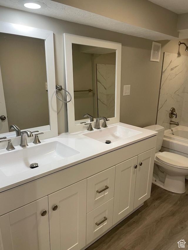197 Ross Dr Lot 6, Clearfield, UT 84015 - bathroom with double vanity, wood finished floors, toilet, and washtub / shower combination