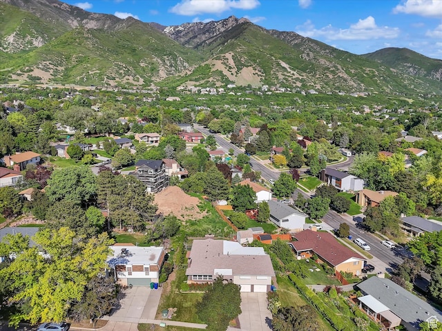 5104 Shawnee Ln, Ogden, UT 84403 - aerial overview of property's location with a mountainous background and nearby suburban area