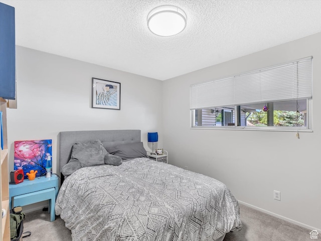 5104 Shawnee Ln, Ogden, UT 84403 - carpeted bedroom featuring a textured ceiling and baseboards
