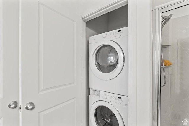 10616 S Topview Rd Unit 152, South Jordan, UT 84009 - laundry room featuring stacked washer / drying machine