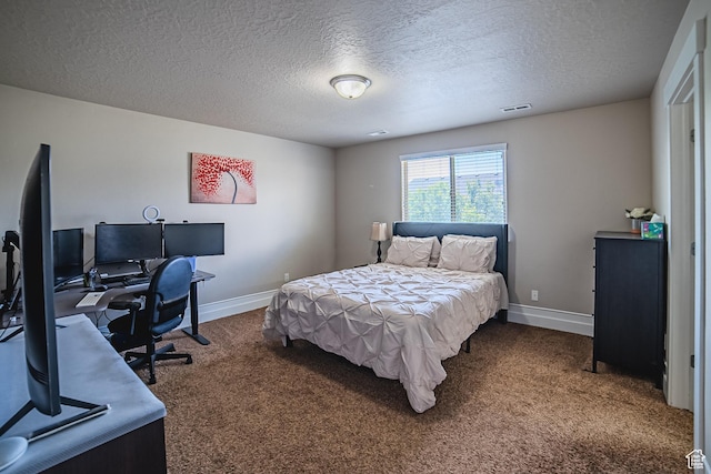 3907 W Tottori Dune Dr S, South Jordan, UT 84095 - bedroom featuring dark colored carpet, a textured ceiling, a desk, and baseboards