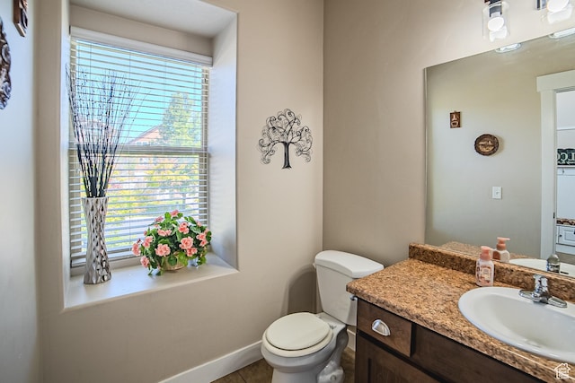 3907 W Tottori Dune Dr S, South Jordan, UT 84095 - half bathroom with vanity, toilet, baseboards, and tile patterned flooring