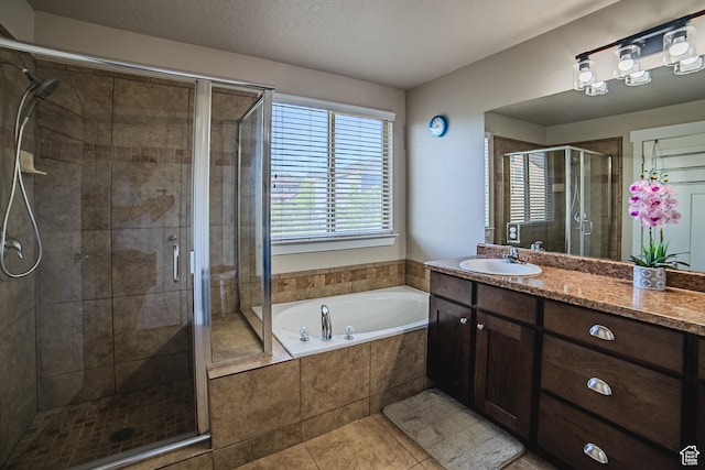 3907 W Tottori Dune Dr S, South Jordan, UT 84095 - full bath with vanity, a garden tub, a stall shower, and tile patterned floors