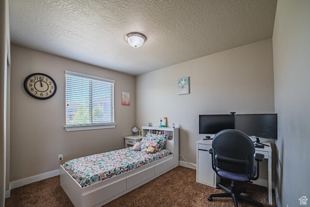 3907 W Tottori Dune Dr S, South Jordan, UT 84095 - bedroom featuring dark carpet, a textured ceiling, an office area, and baseboards