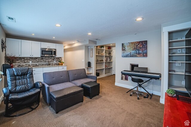 3907 W Tottori Dune Dr S, South Jordan, UT 84095 - living room with carpet, baseboards, an office area, and recessed lighting