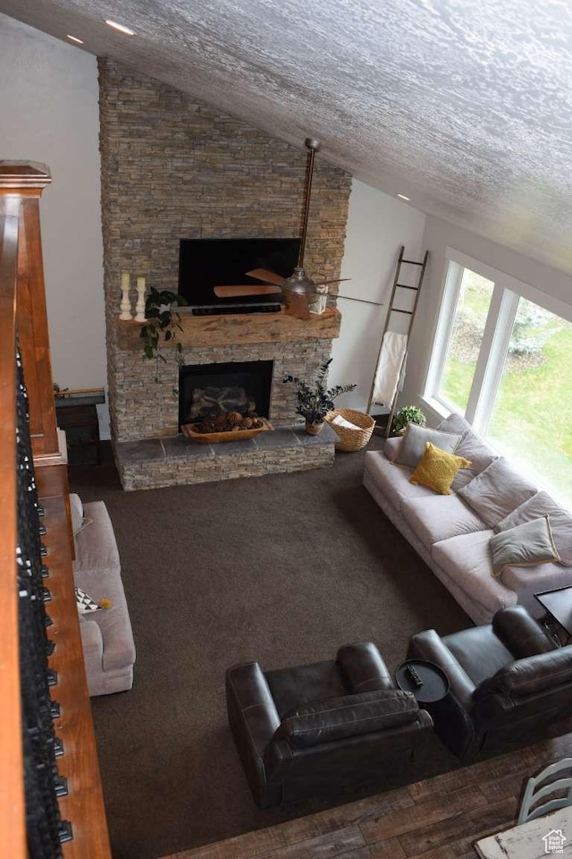 4633 E Glendale Rd, Preston, ID 83263 - living room with a stone fireplace and lofted ceiling