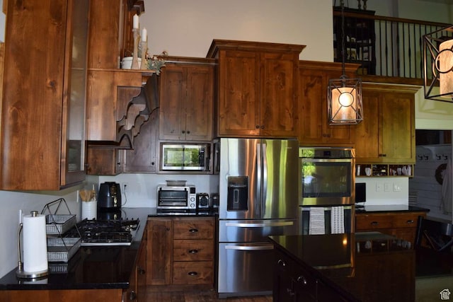 4633 E Glendale Rd, Preston, ID 83263 - kitchen with stainless steel appliances and dark countertops