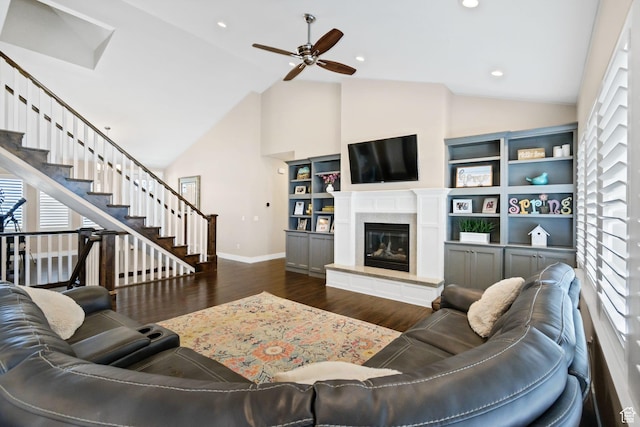495 E 100 S, Centerfield, UT 84622 - living room featuring ceiling fan, dark wood-style flooring, baseboards, a fireplace, and stairs