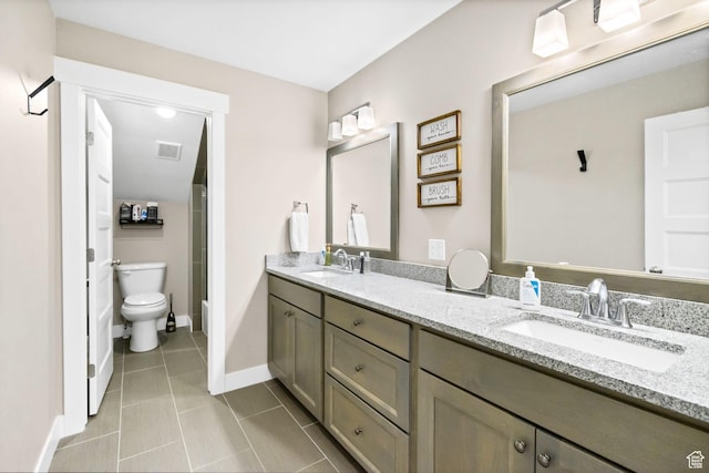 495 E 100 S, Centerfield, UT 84622 - bathroom with double vanity, tile patterned flooring, baseboards, and toilet