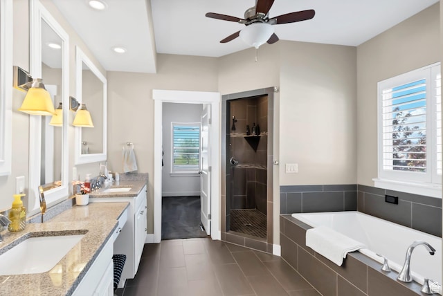 495 E 100 S, Centerfield, UT 84622 - bathroom with double vanity, ceiling fan, a stall shower, a bath, and tile patterned floors