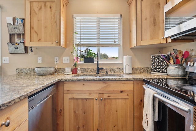5748 S 3975 W, Roy, UT 84067 - kitchen with appliances with stainless steel finishes, a sink, light brown cabinets, and light stone countertops