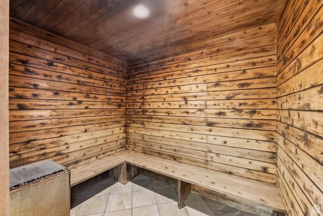 2669 Canyons Resort Dr Unit 304A, Park City, UT 84098 - relaxing sauna featuring tile patterned flooring, wood walls, and wooden ceiling