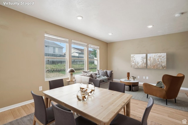 802 E 580 N, Tooele, UT 84074 - dining space featuring light wood-style floors, baseboards, and recessed lighting