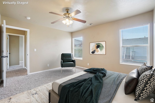 802 E 580 N, Tooele, UT 84074 - bedroom featuring carpet, multiple windows, baseboards, and a ceiling fan
