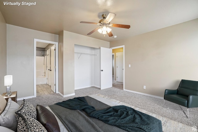 802 E 580 N, Tooele, UT 84074 - bedroom featuring light colored carpet, baseboards, a closet, ensuite bathroom, and ceiling fan
