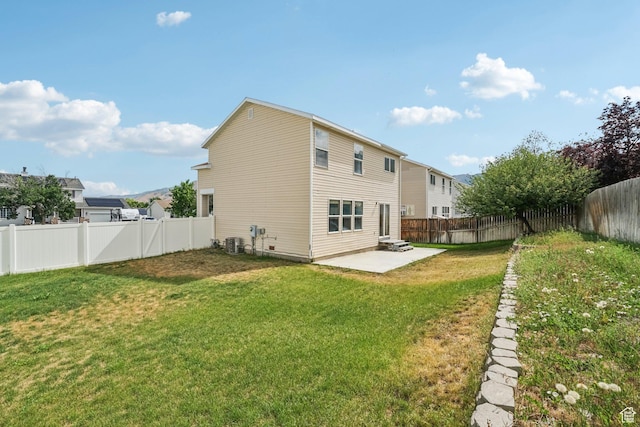 802 E 580 N, Tooele, UT 84074 - back of property with a patio area and central AC unit
