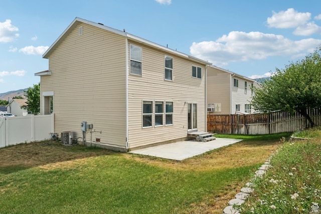 802 E 580 N, Tooele, UT 84074 - rear view of property with a patio and central AC unit