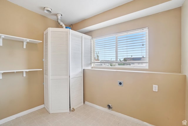 802 E 580 N, Tooele, UT 84074 - laundry room with electric dryer hookup, baseboards, and light flooring