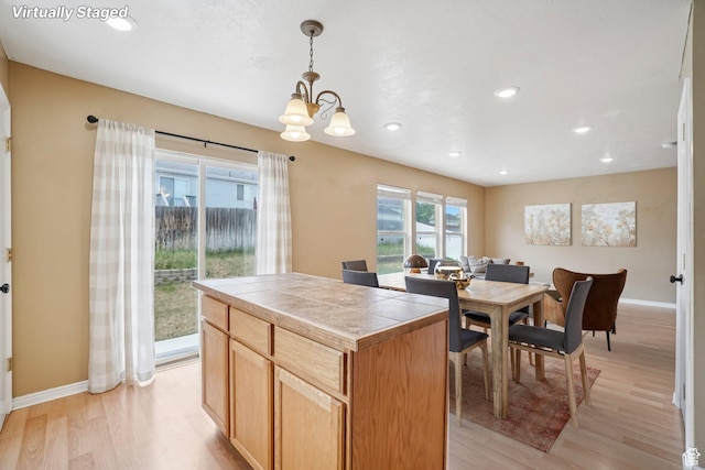 802 E 580 N, Tooele, UT 84074 - kitchen featuring tile counters, a chandelier, light wood-style flooring, baseboards, and recessed lighting