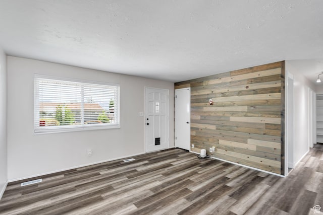 5230 S 5200 W, Kearns, UT 84118 - entrance foyer featuring wood finished floors, wood walls, and baseboards