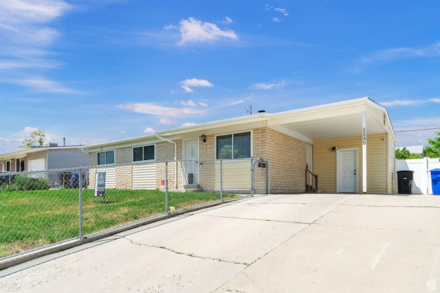 5230 S 5200 W, Kearns, UT 84118 - view of front of home featuring an attached carport and driveway