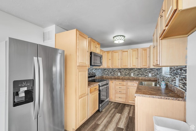 5230 S 5200 W, Kearns, UT 84118 - kitchen featuring appliances with stainless steel finishes, light brown cabinetry, a sink, and dark wood finished floors
