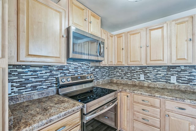 5230 S 5200 W, Kearns, UT 84118 - kitchen with appliances with stainless steel finishes, light brown cabinetry, and tasteful backsplash