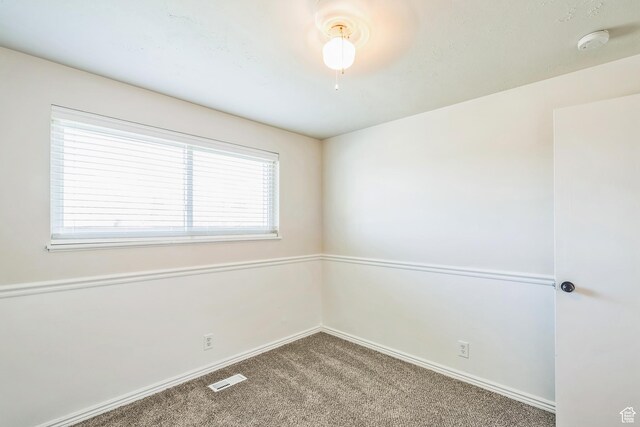 5230 S 5200 W, Kearns, UT 84118 - spare room with a smoke detector, carpet floors, and baseboards