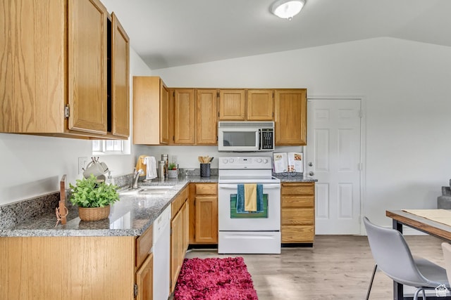 6353 W 3100 S, West Valley City, UT 84128 - kitchen with white appliances, a sink, vaulted ceiling, light wood-style floors, and stone countertops