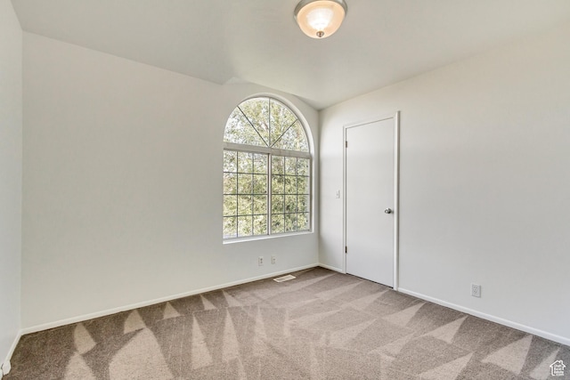 6353 W 3100 S, West Valley City, UT 84128 - carpeted spare room with healthy amount of natural light, baseboards, and vaulted ceiling