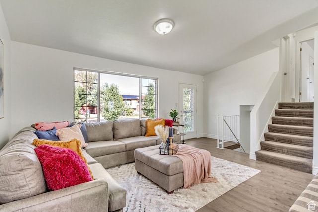 6353 W 3100 S, West Valley City, UT 84128 - living area with plenty of natural light, wood finished floors, stairs, and baseboards