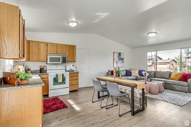 6353 W 3100 S, West Valley City, UT 84128 - kitchen featuring stainless steel microwave, white electric range, vaulted ceiling, light wood finished floors, and open floor plan