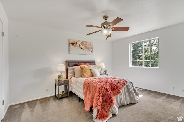 6353 W 3100 S, West Valley City, UT 84128 - carpeted bedroom featuring baseboards and ceiling fan