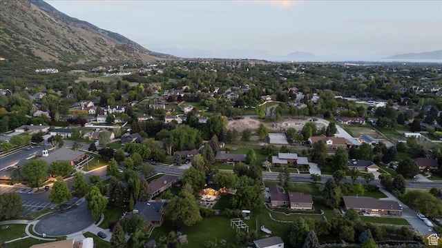 971 E Village Way, Alpine, UT 84004 - aerial overview of property's location featuring a mountain backdrop and nearby suburban area