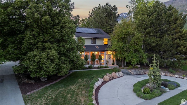 971 E Village Way, Alpine, UT 84004 - rear view of property with solar panels and a lawn