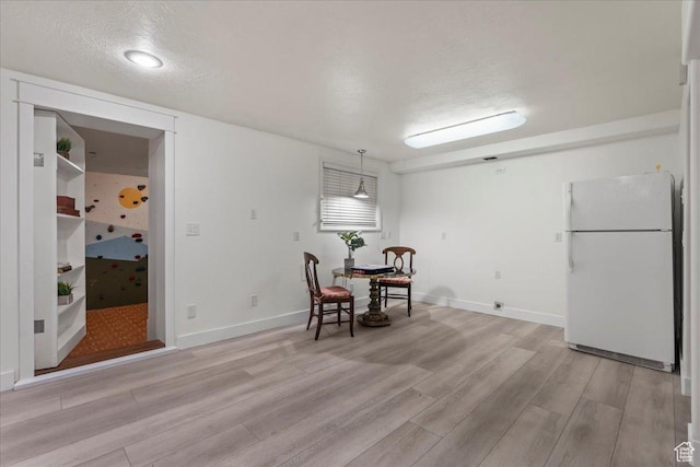971 E Village Way, Alpine, UT 84004 - dining space with light wood-style flooring and baseboards