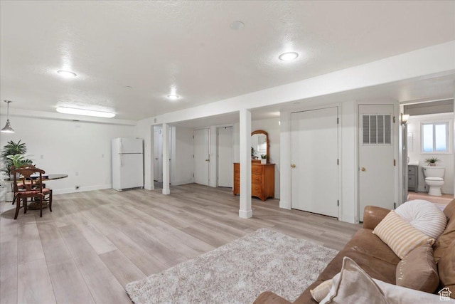 971 E Village Way, Alpine, UT 84004 - living room featuring light wood finished floors and recessed lighting