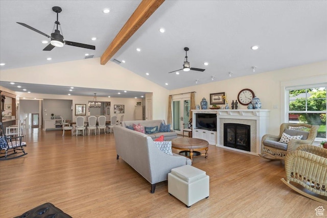 971 E Village Way, Alpine, UT 84004 - living area featuring ceiling fan, light wood finished floors, a glass covered fireplace, recessed lighting, and a chandelier
