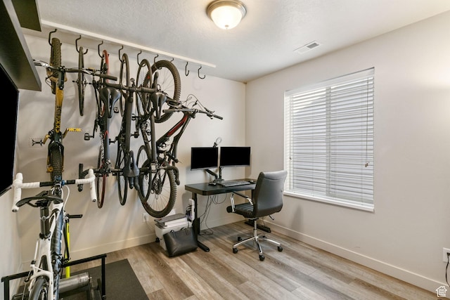 1135 Surrey Dr, North Salt Lake, UT 84054 - office area with wood finished floors and baseboards