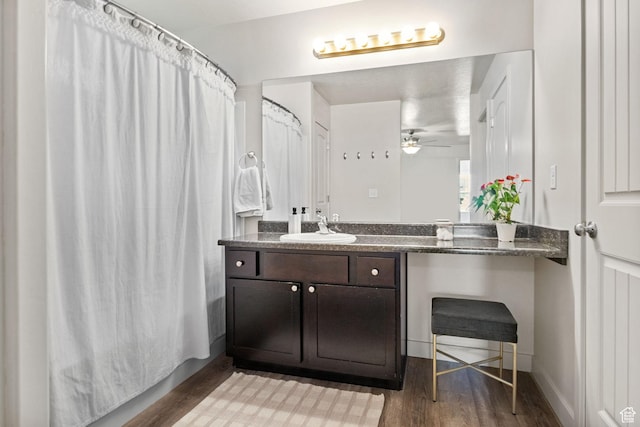 1135 Surrey Dr, North Salt Lake, UT 84054 - full bathroom with wood finished floors, vanity, and a ceiling fan