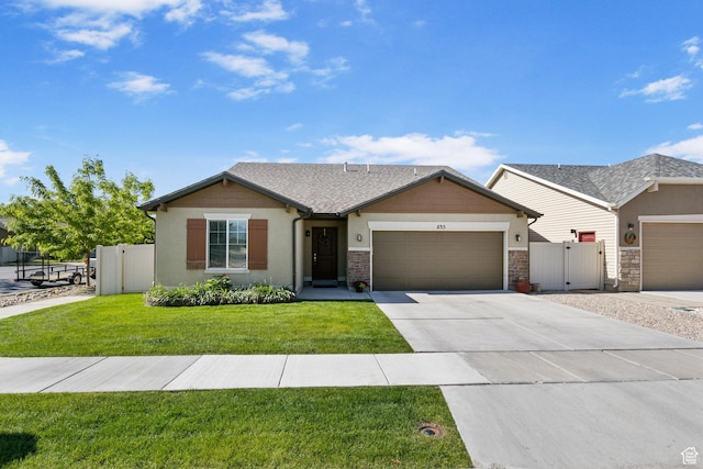 1135 Surrey Dr, North Salt Lake, UT 84054 - view of front of property with a gate, an attached garage, driveway, and stucco siding