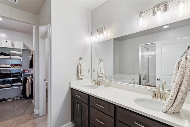 94 N 3830 W, West Point, UT 84015 - full bath with double vanity, a walk in closet, a stall shower, and a tub to relax in