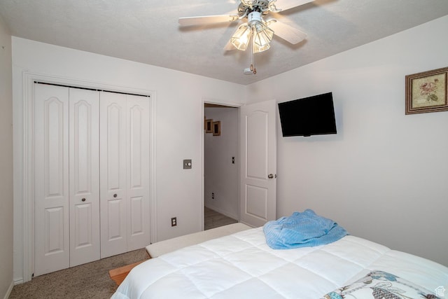576 S Fiesta Dr, Ivins, UT 84738 - carpeted bedroom with a closet, ceiling fan, and baseboards