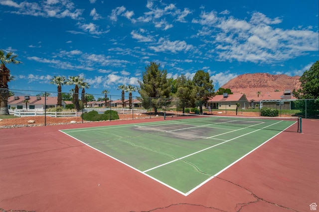 576 S Fiesta Dr, Ivins, UT 84738 - view of tennis court with community basketball court and a mountain view