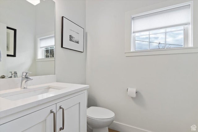 848 S Greenwood Ter E, Salt Lake City, UT 84105 - half bath with toilet, healthy amount of natural light, and vanity