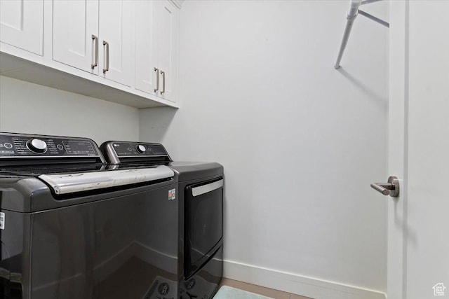 848 S Greenwood Ter E, Salt Lake City, UT 84105 - washroom with washer and dryer, baseboards, and cabinet space