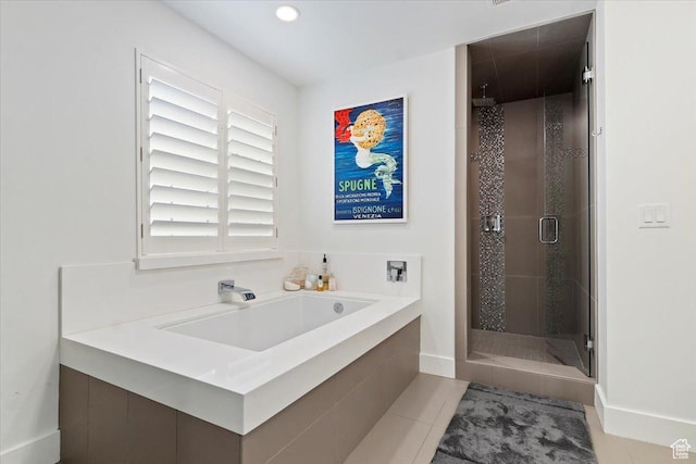 848 S Greenwood Ter E, Salt Lake City, UT 84105 - bathroom with a shower stall, a sink, a bath, tile patterned flooring, and recessed lighting