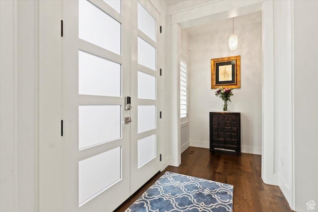 848 S Greenwood Ter E, Salt Lake City, UT 84105 - entryway featuring dark wood-style floors and baseboards