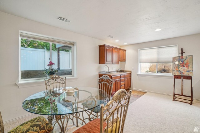 4538 Cottage Grove Ln, Murray, UT 84107 - dining space with light carpet, baseboards, and recessed lighting