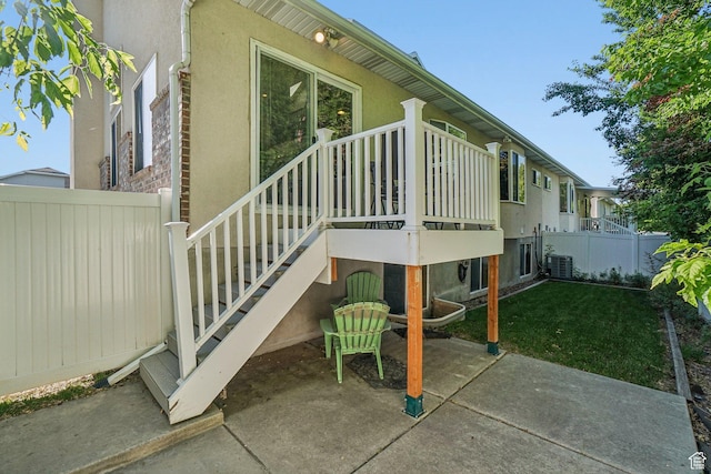 4538 Cottage Grove Ln, Murray, UT 84107 - view of side of home with a patio area, stucco siding, and central AC